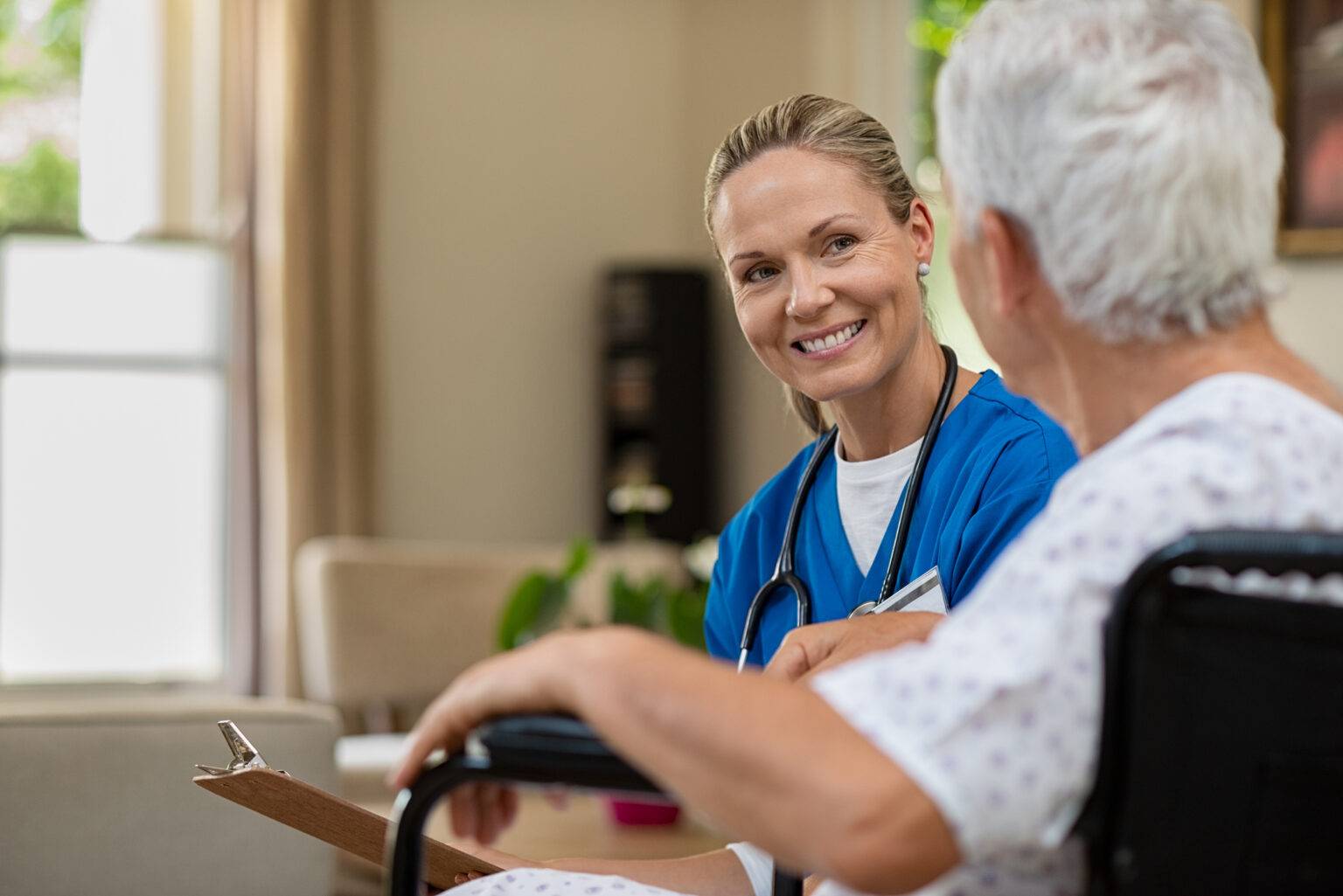 Compassionate caregiver connecting with resident through personalized care in Mesquite, TX